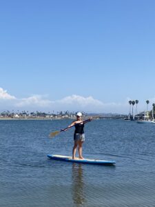 Megan on a Stand Up Paddleboard in Pacific Beach, CA